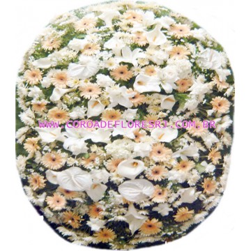 32 - COROA CONTENDO GERBERAS COPO DE LEITE E LIRIOS TAMANHO 1,50 X 1,00 